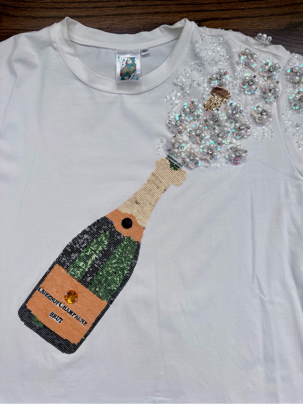 QUEEN OF SPARKLES White Champagne Bottle Sequin Tee - Picture 2 of 4